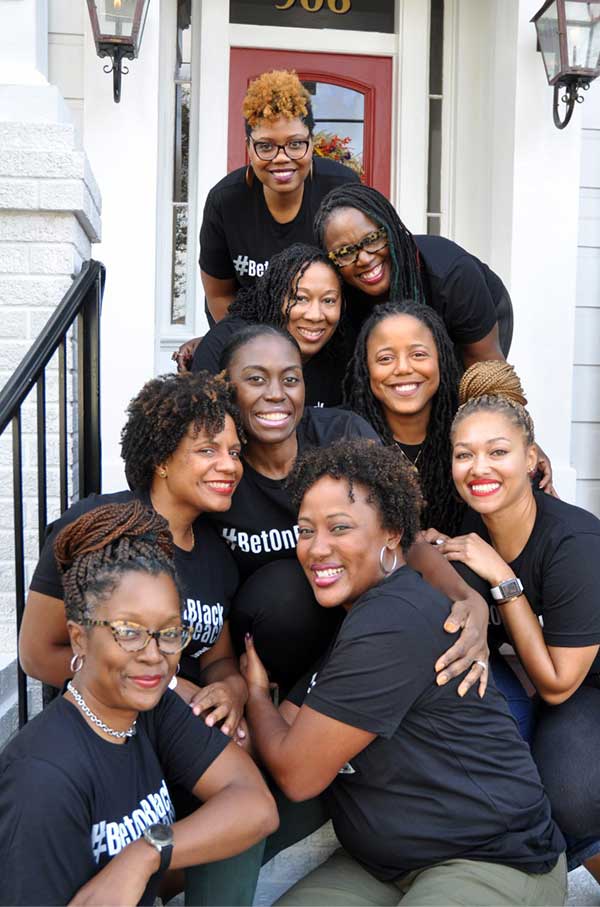 photo of Black Teacher Collaborative women wearing Bet On Black t-shirts
