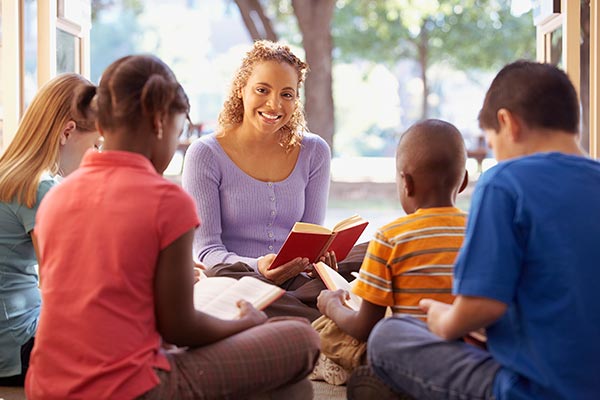 kids studying bible in group