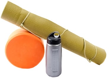yoga mat with foam roller and water bottle